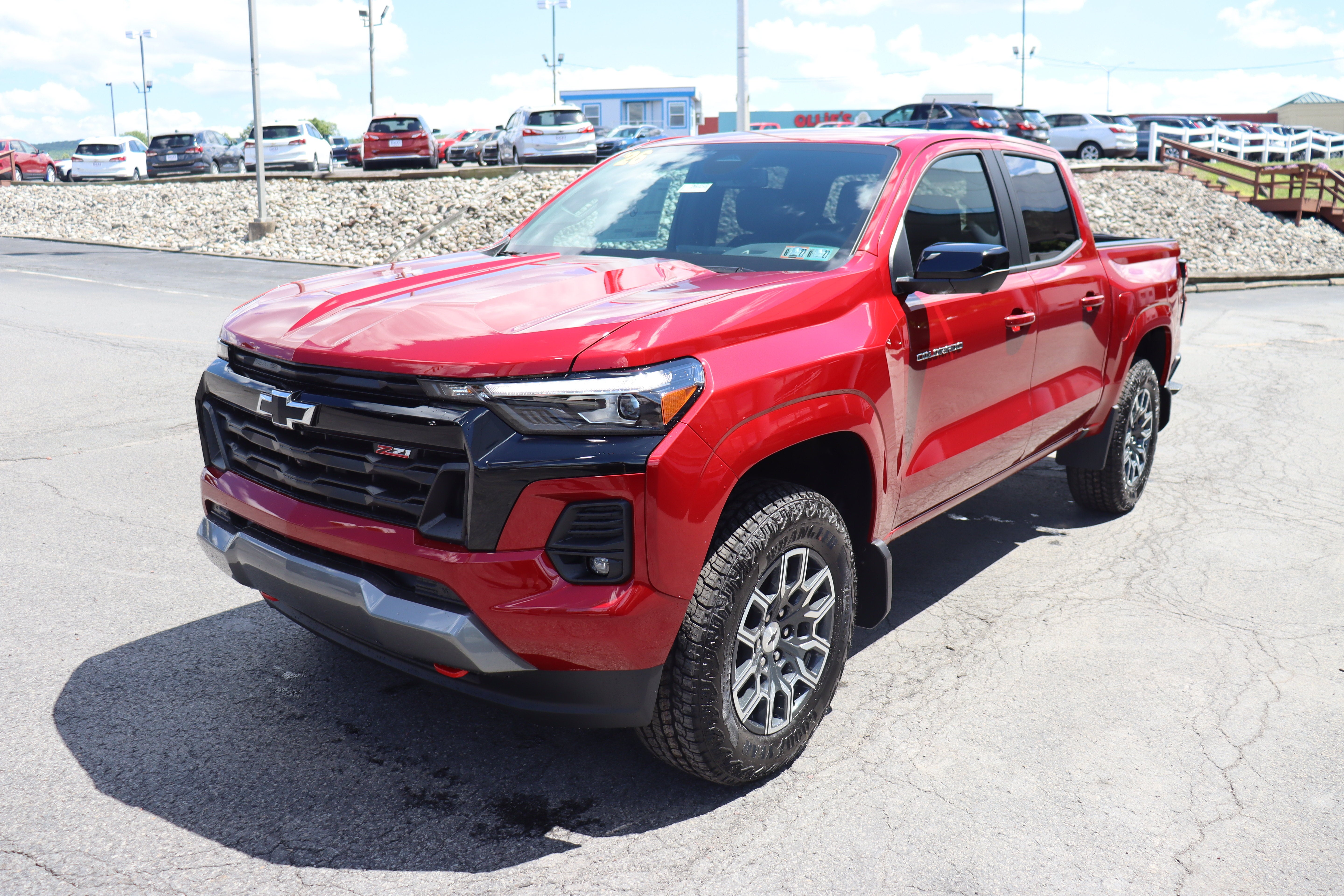 2026 Chevrolet Colorado Z71 in Radiant Red Tintcoat — front three-quarter view