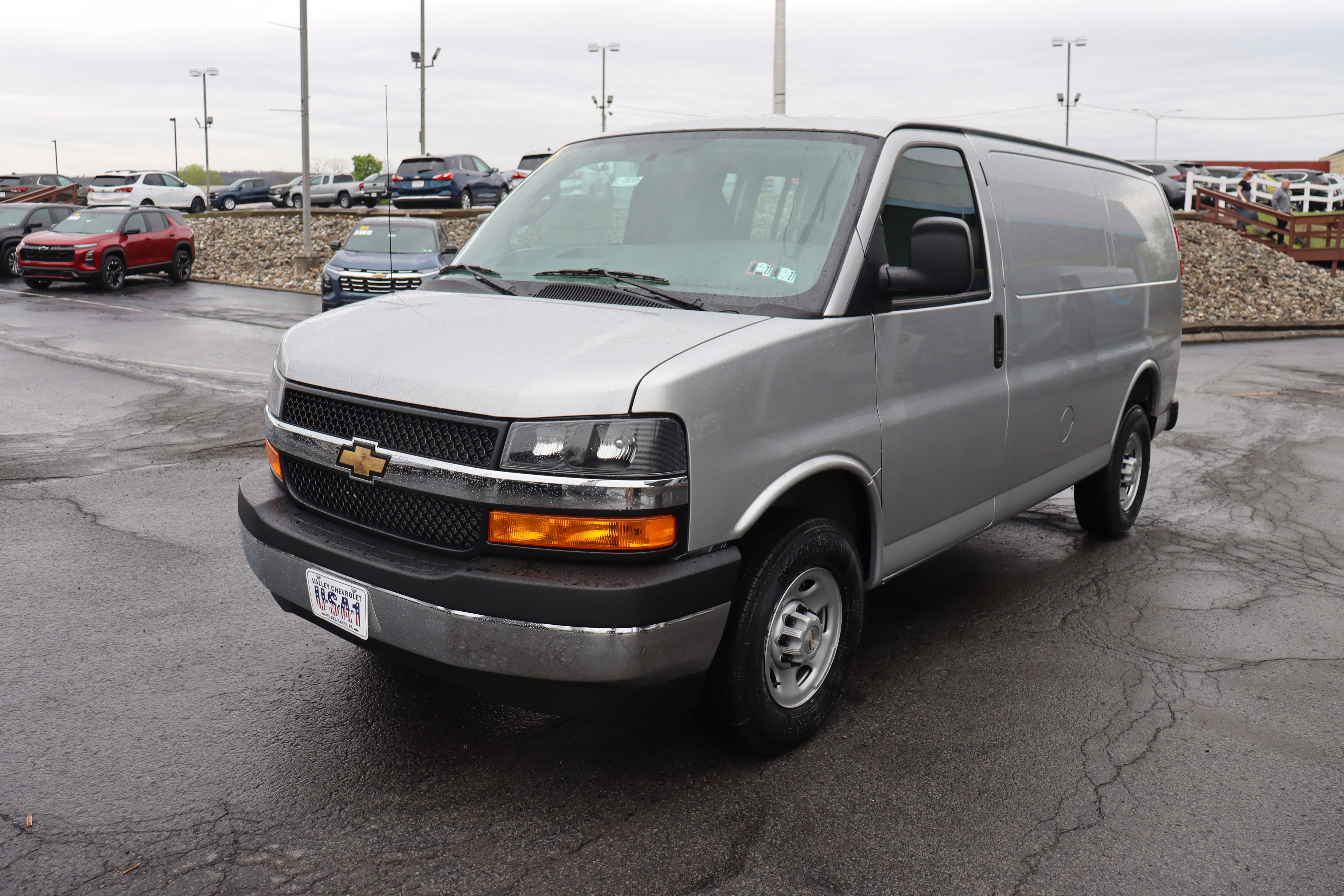 2026 Chevrolet Express Cargo WT in Silver Ice Metallic — front three-quarter view