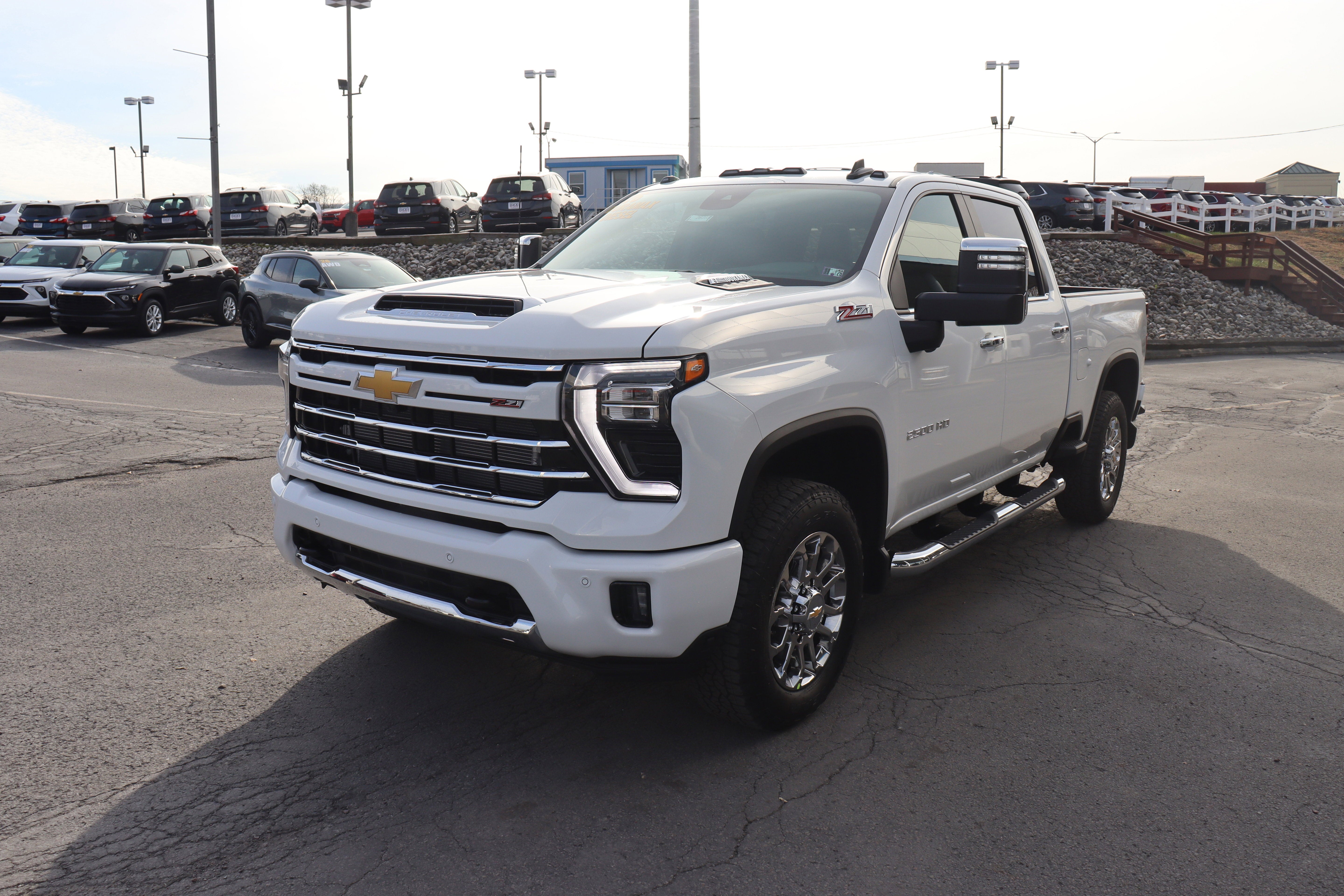 2026 Chevrolet Silverado 2500 HD LT in Summit White — front three-quarter view