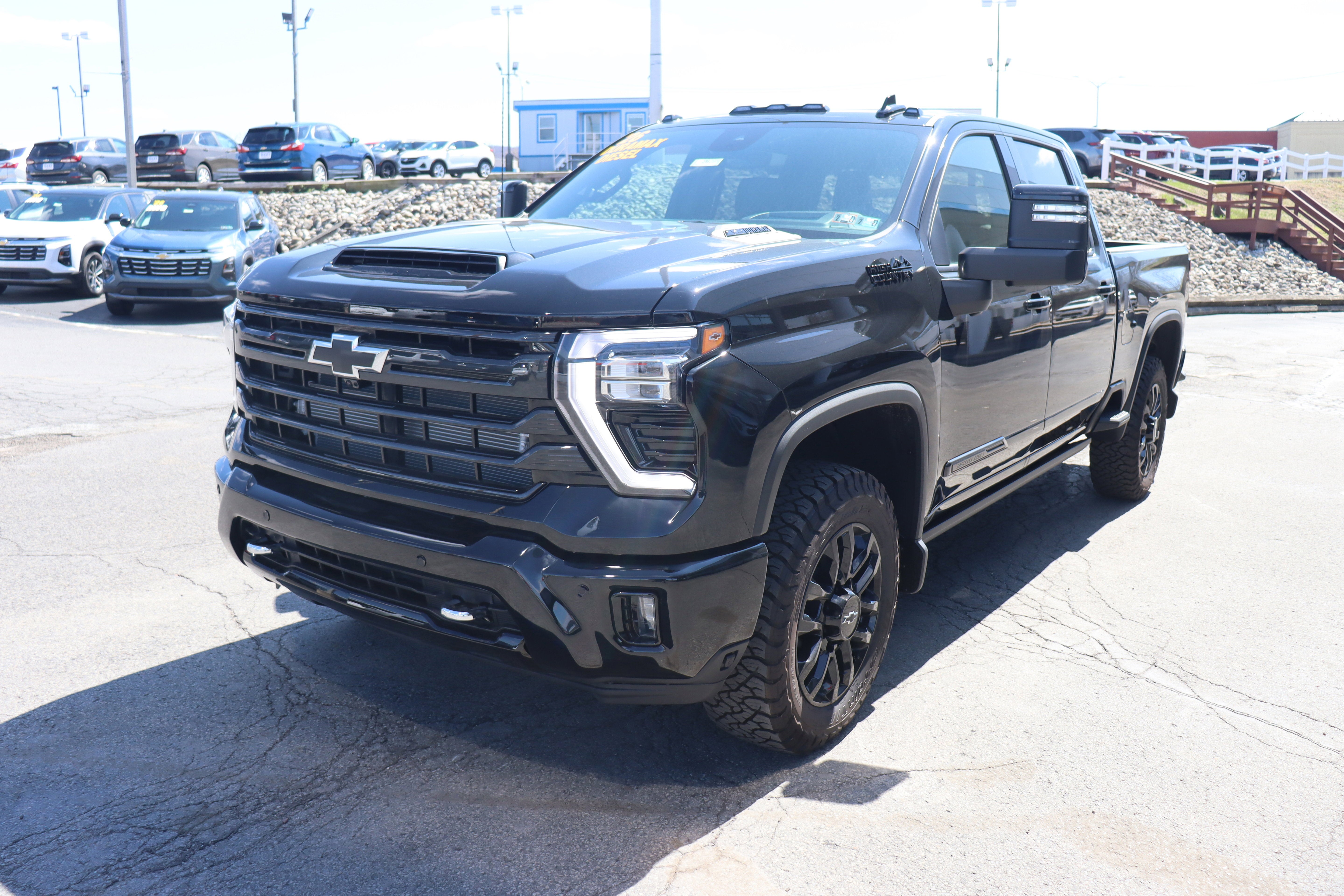 2026 Chevrolet Silverado 2500 HD High Country in Black — front three-quarter view