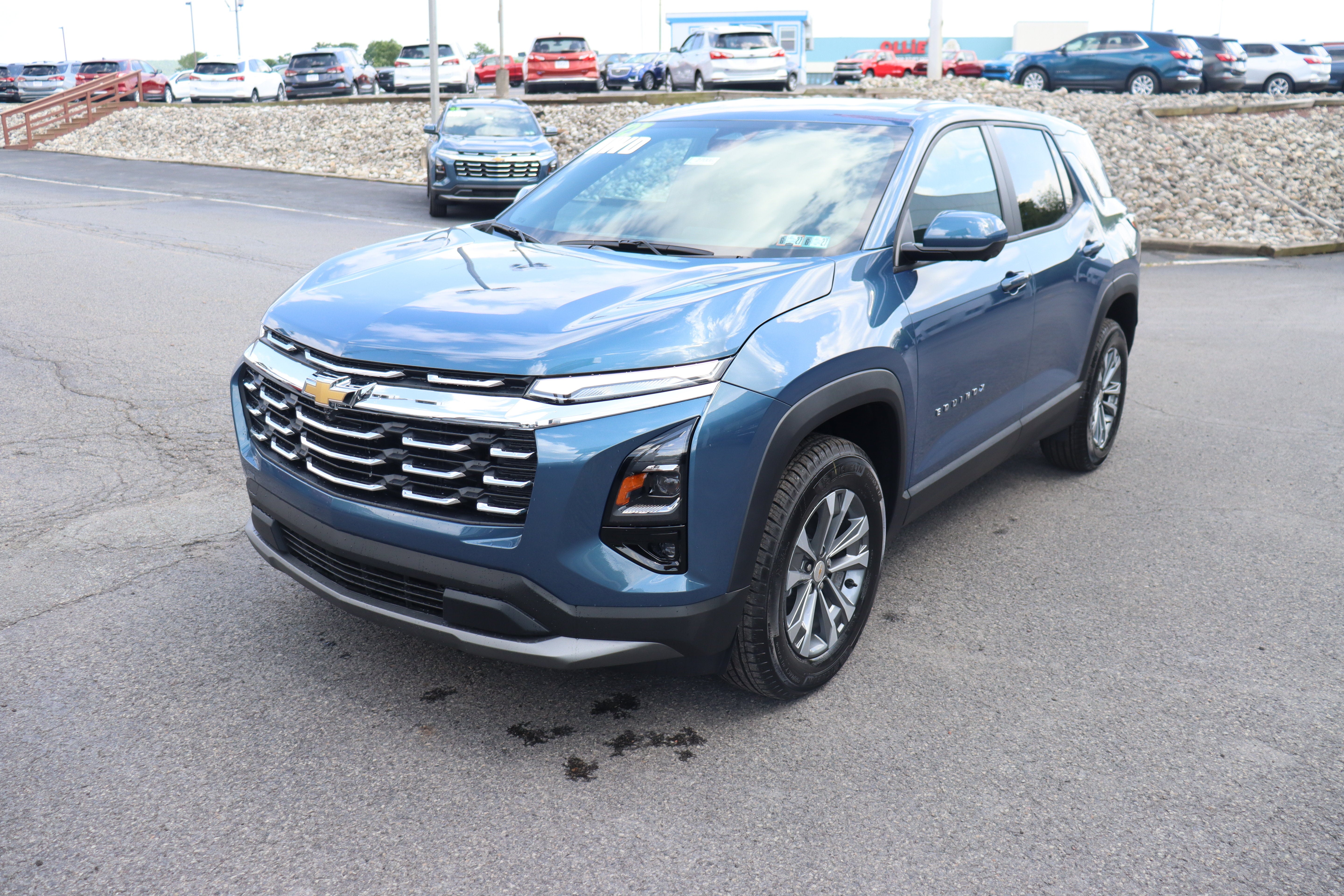 2027 Chevrolet Equinox AWD LT in Lakeshore Blue Metallic — front three-quarter view