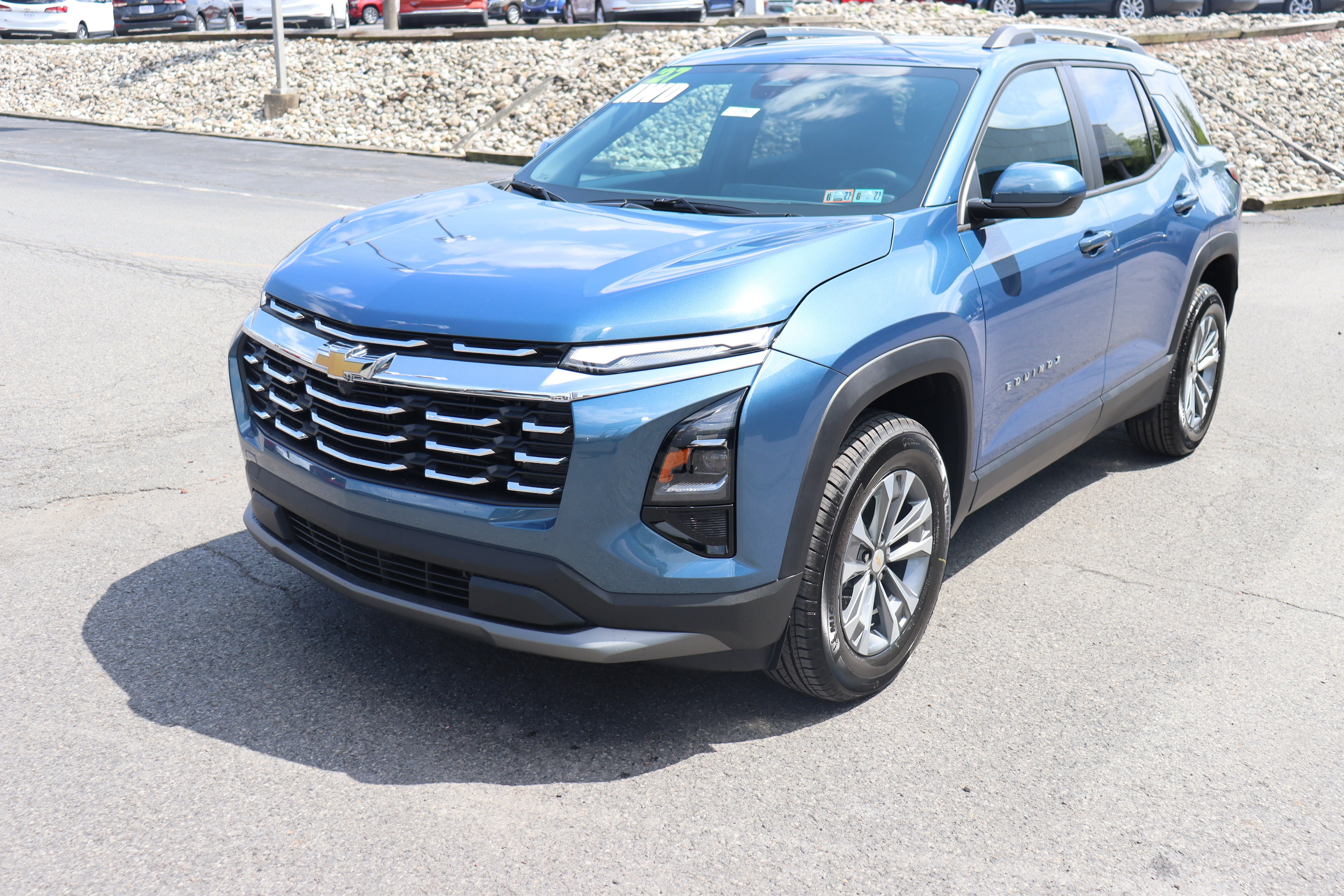 2027 Chevrolet Equinox AWD LT in Lakeshore Blue Metallic — front three-quarter view