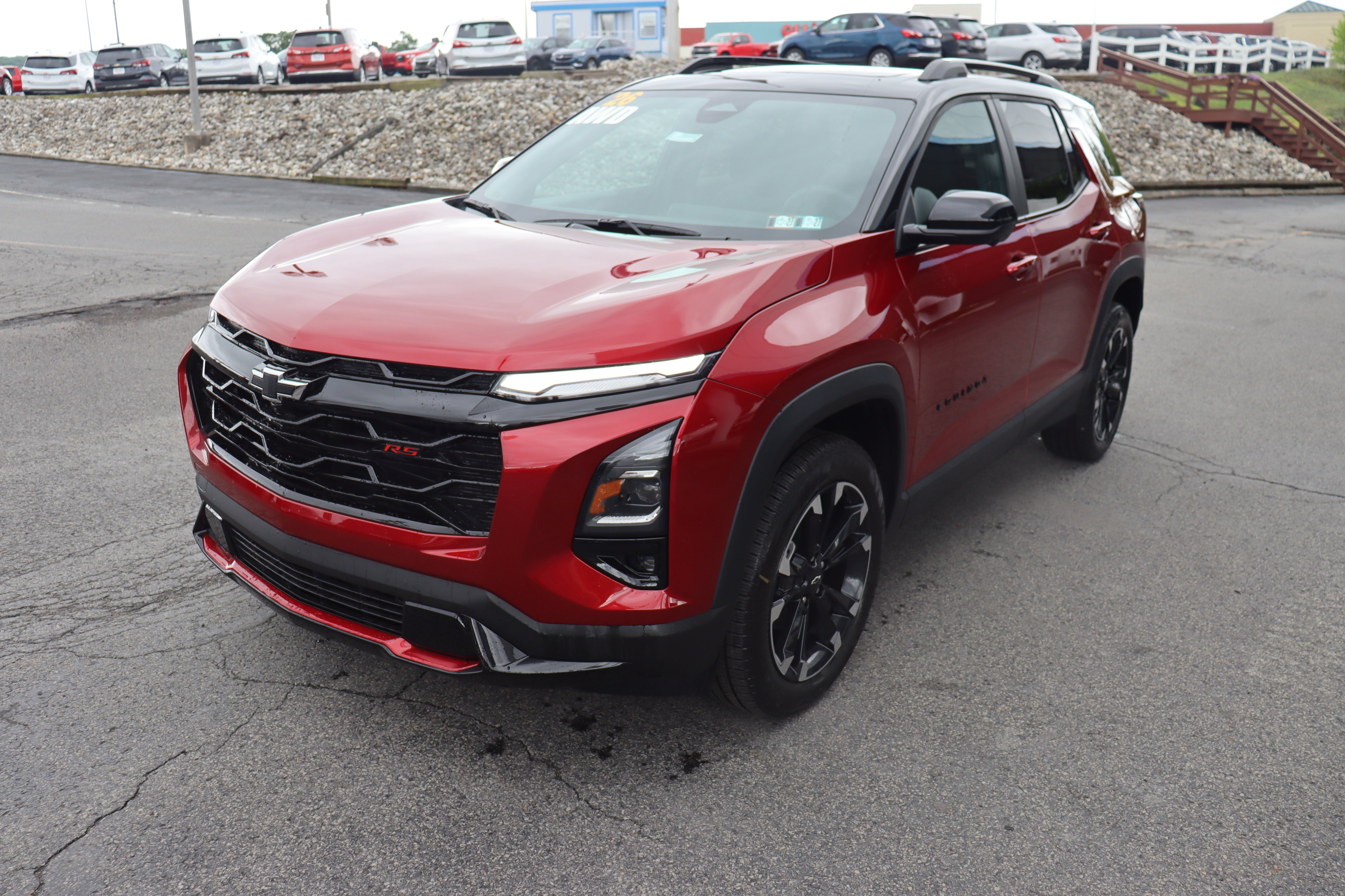 2026 Chevrolet Equinox RS in Radiant Red Tintcoat — front three-quarter view