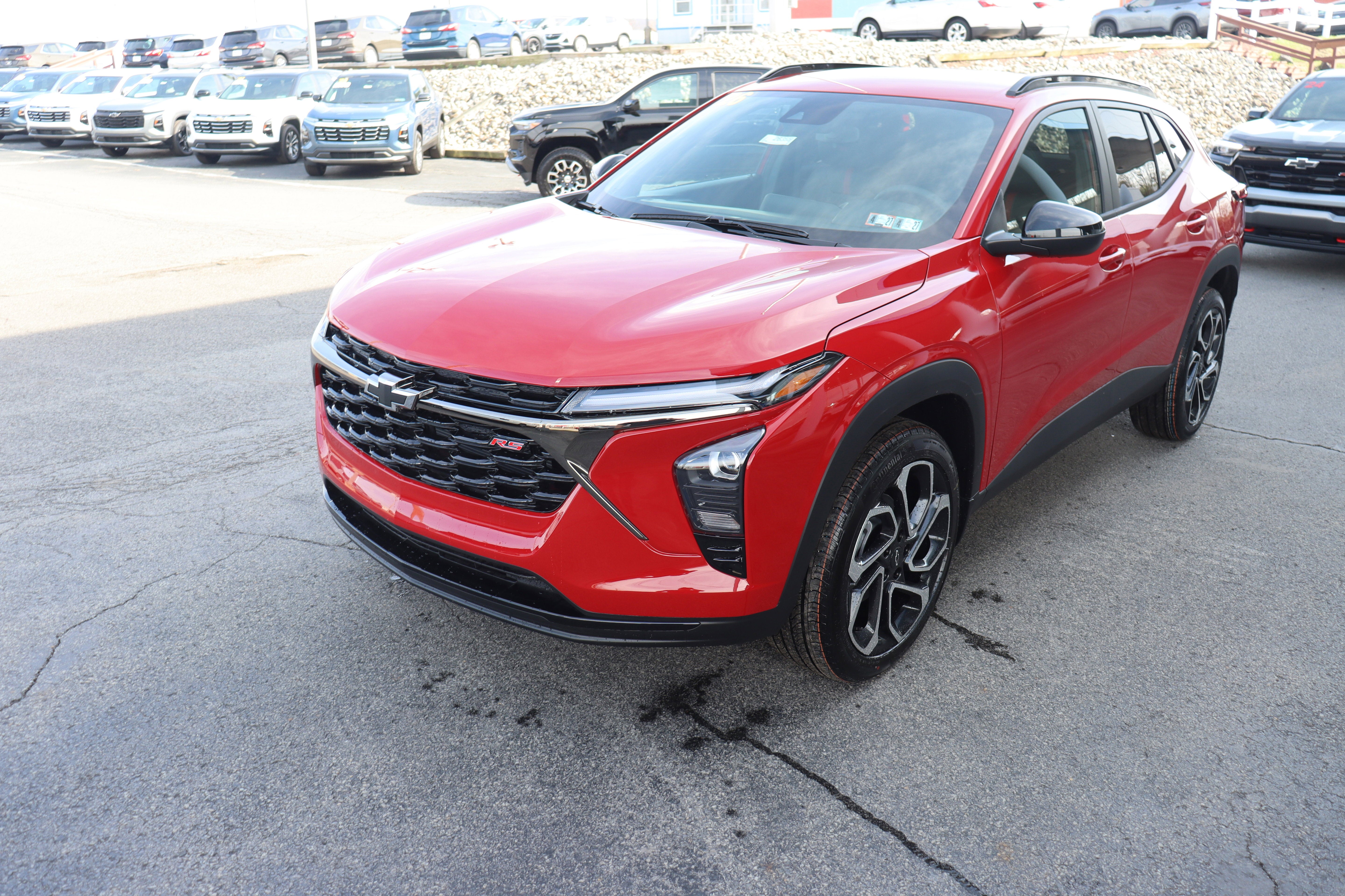 2026 Chevrolet Trax 2RS in Apex Red — front three-quarter view